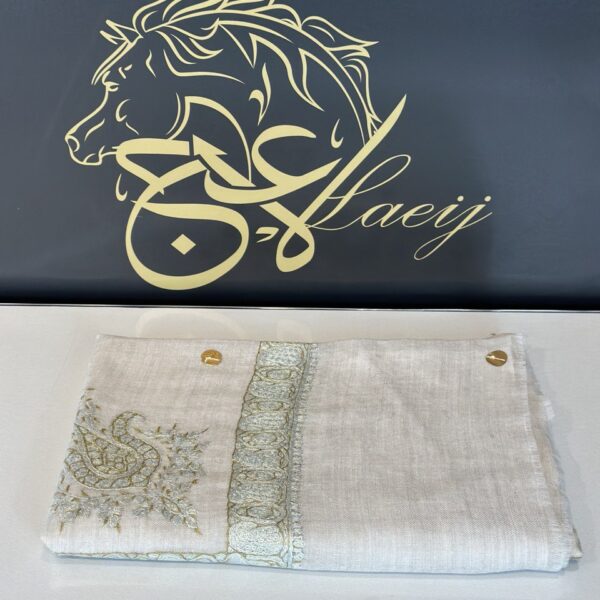 A LUXURIOUS FULLY HANDMADE PASHMINA LIGHT BEIGE COLOR SHAL.  ROYAL ENGRAVING IN THE MODERN EMIRATI STYLE IN   BROWN, GOLDEN, LIGHT BLUE, LIGHT GREEN COLORS.