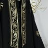 A BLACK  OVERCOAT MADE OF CASHMERE WOOL FABRIC